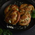 four pretzels on a plate
