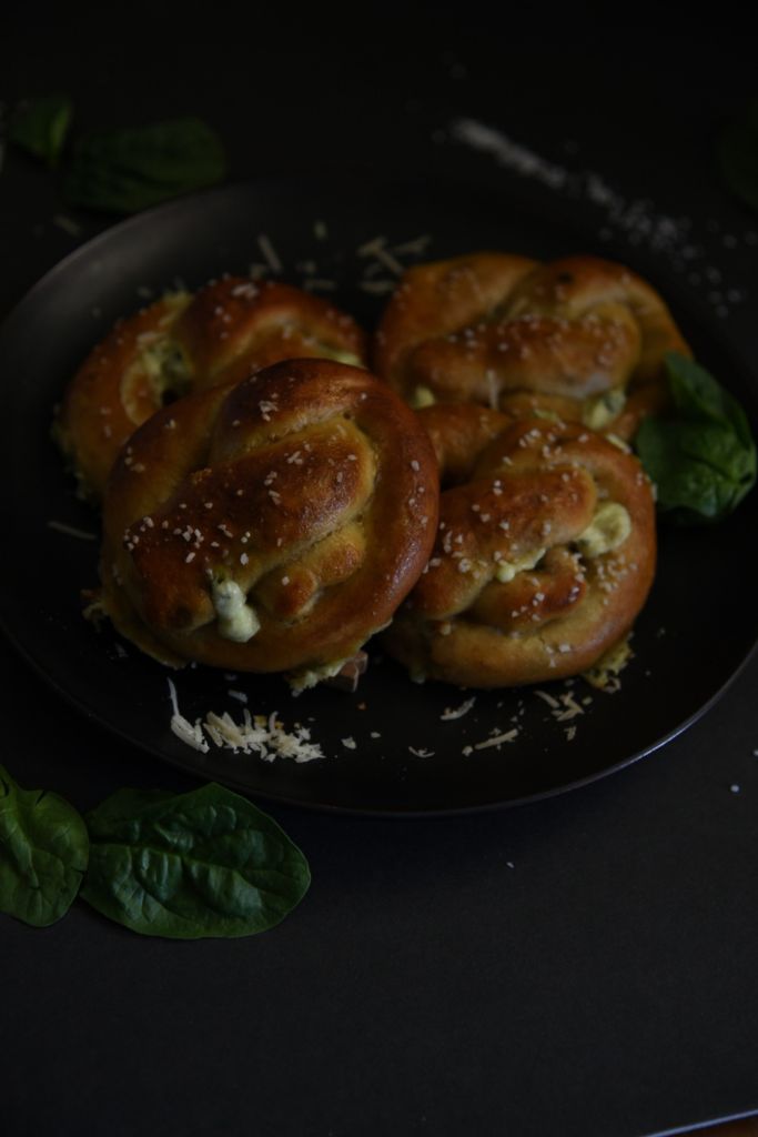 four pretzels on a plate