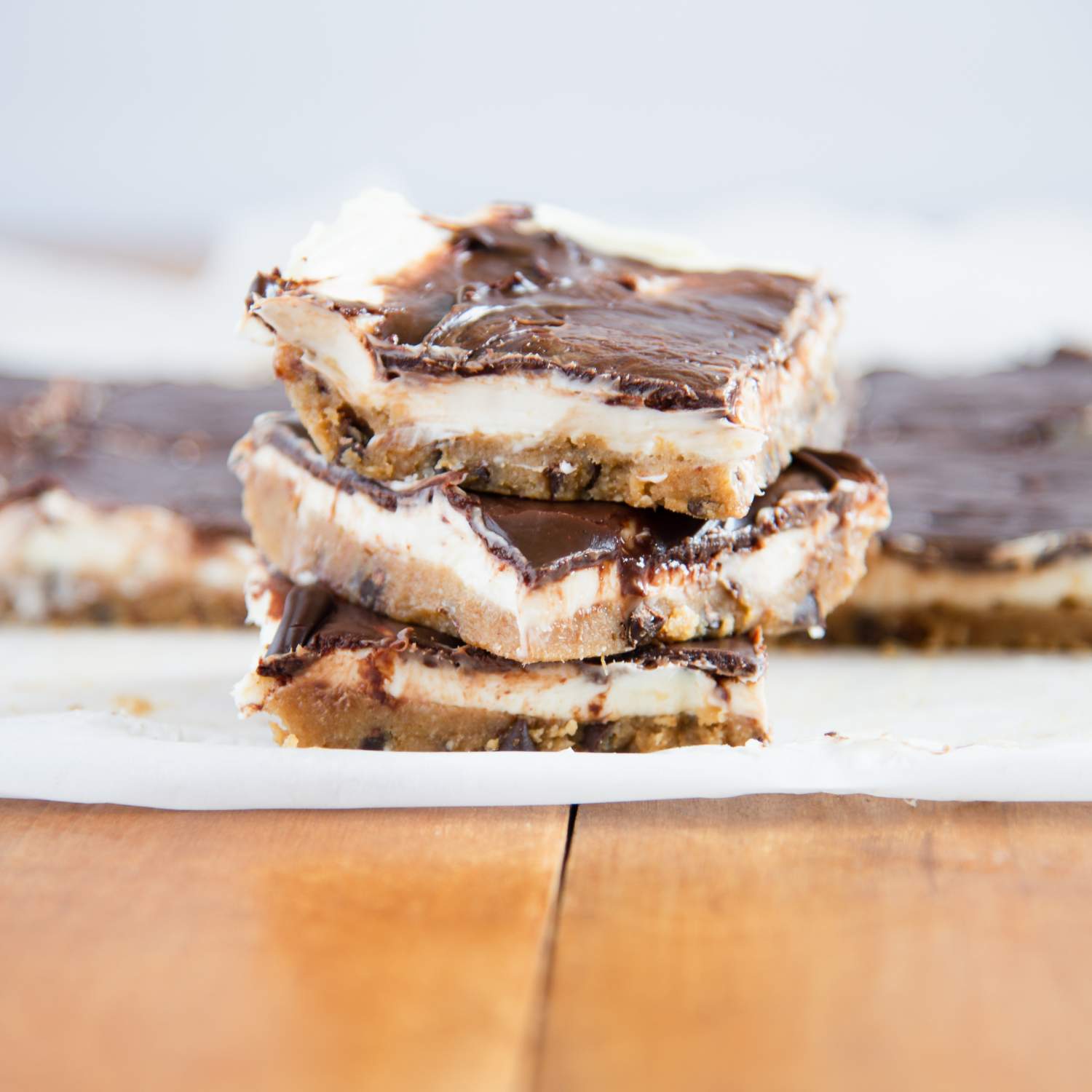 Healthy no-bake cheesecake bars with cookie dough crust